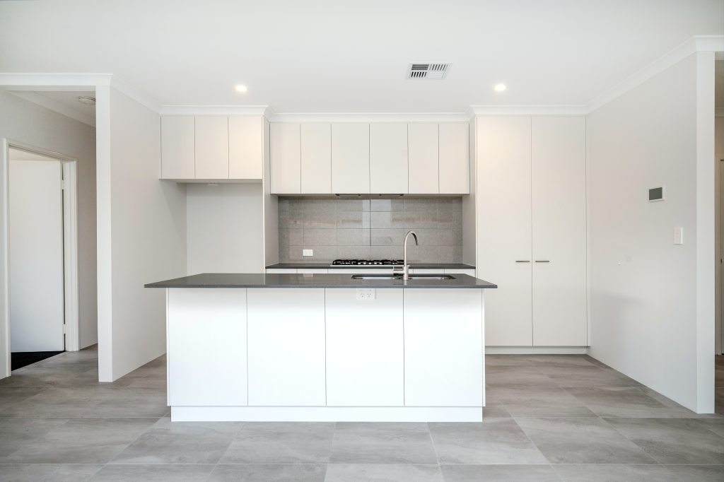 Modern kitchen with white cabinetry
