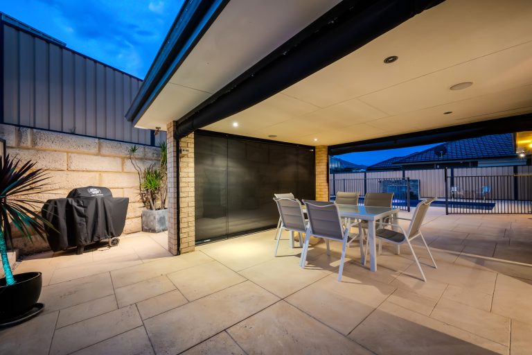 Stylish open-plan living area with modern furniture and natural light in a Tapping family home on Oriole Way