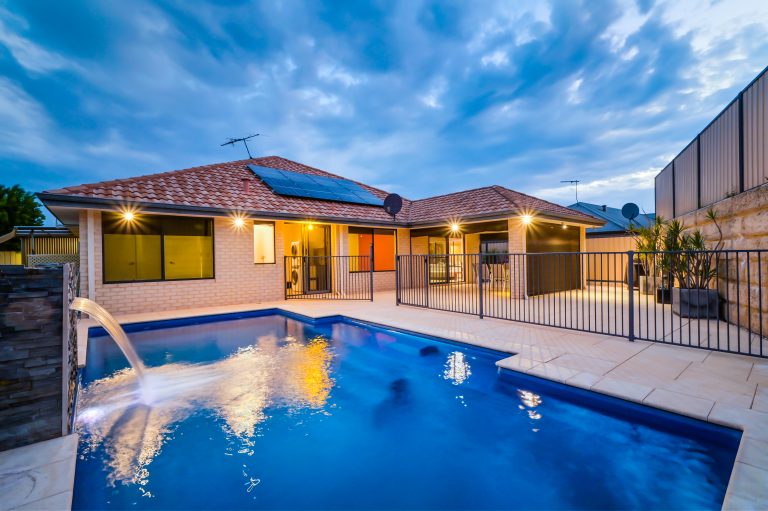 Stylish open-plan living area with modern furniture and natural light in a Tapping family home on Oriole Way