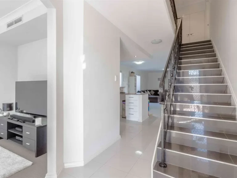 Modern interior with stairs and living area