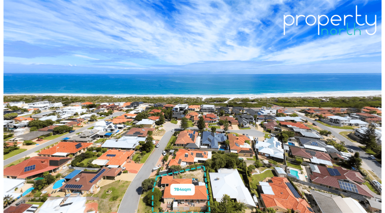 Aerial View Of Coastal Neighborhood.
