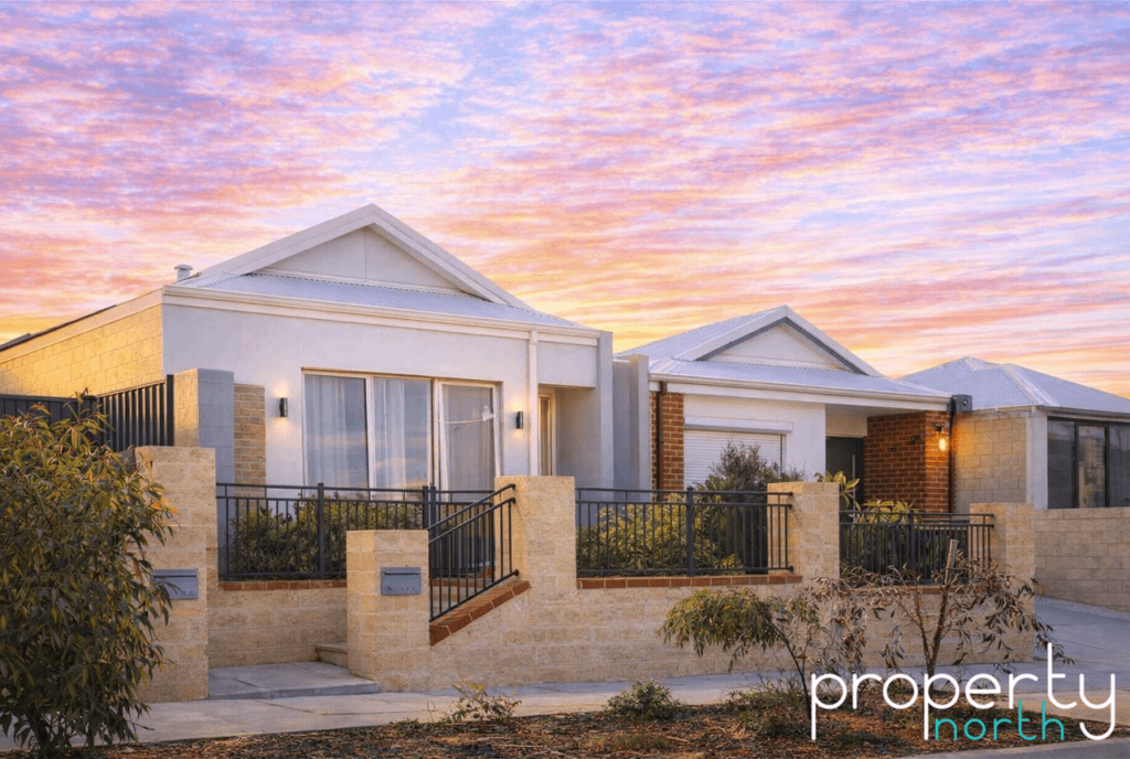 Modern houses at sunset with landscaping
